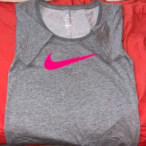 A nike t-shirt, women xs but fits like a small. Only worn a handful of times.